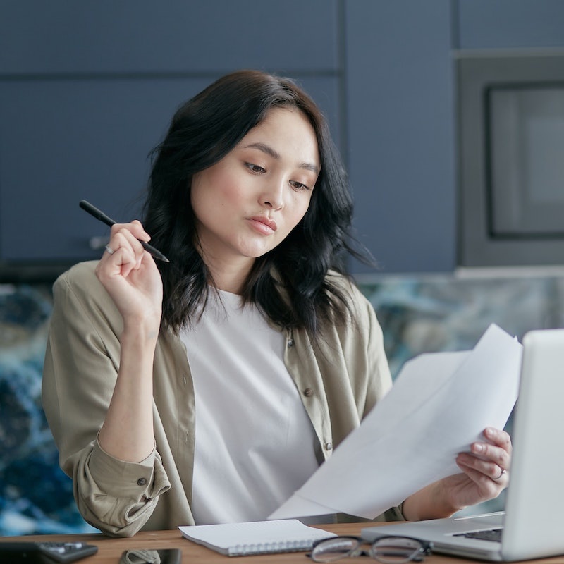 Woman With Paper